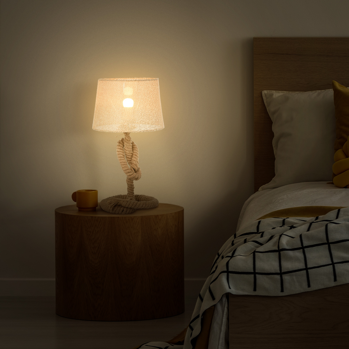 Close-up of the Aldeburgh table lamp's hemp rope and linen drum shade, highlighting the craftsmanship and material details