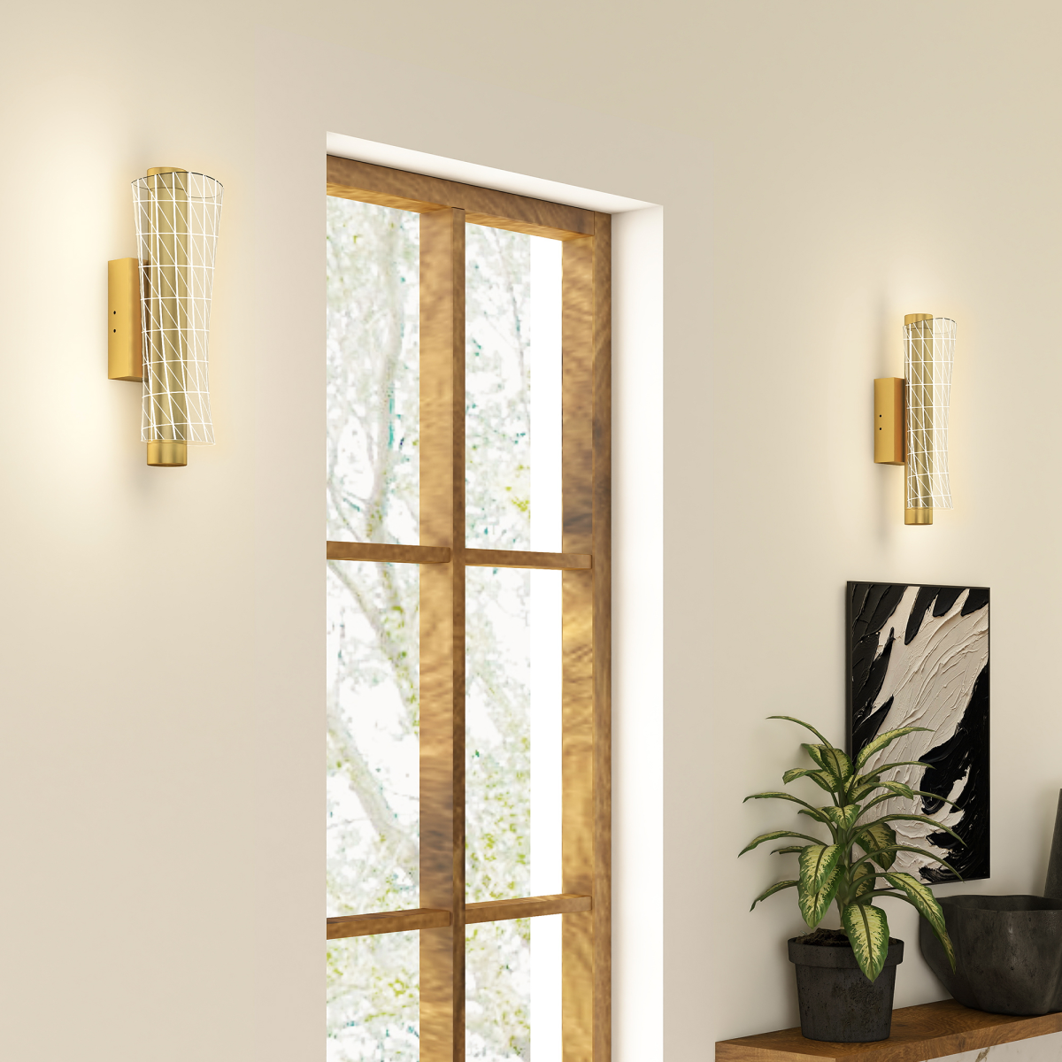 View of the Hatton brushed gold wall sconce from below, highlighting its geometric design and elegant presence in a hallway