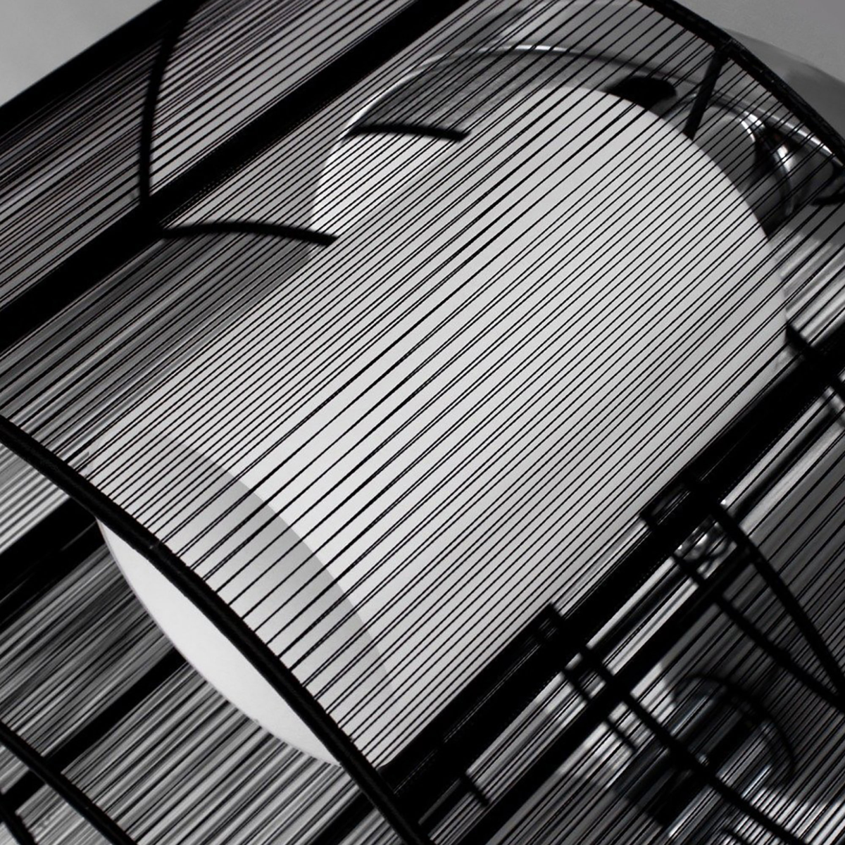 Close-up of the Kura twin-shade ceiling light's mounting mechanism and design details, emphasising quality craftsmanship