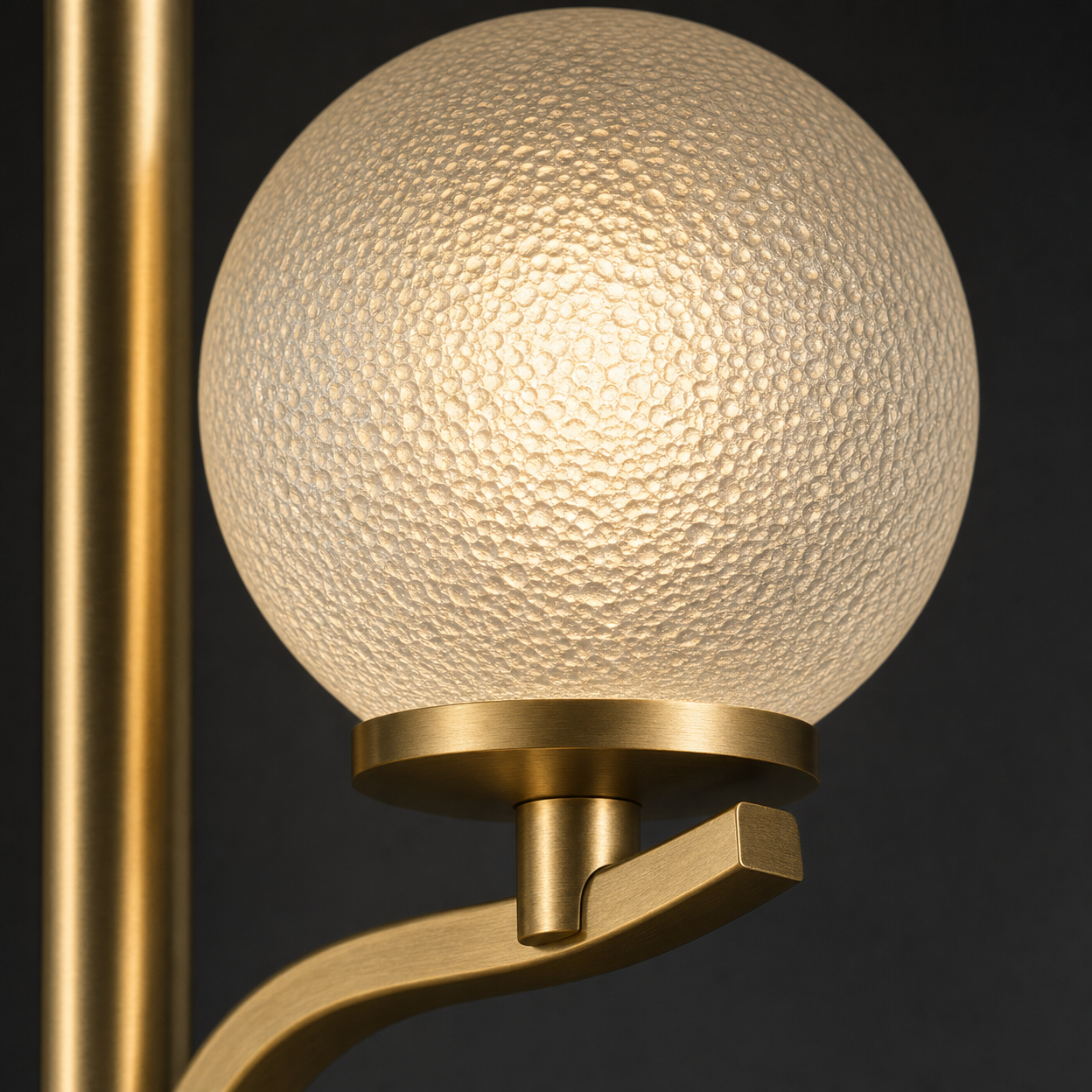 Close-up detail of Belsize textured glass shade and gold metalwork