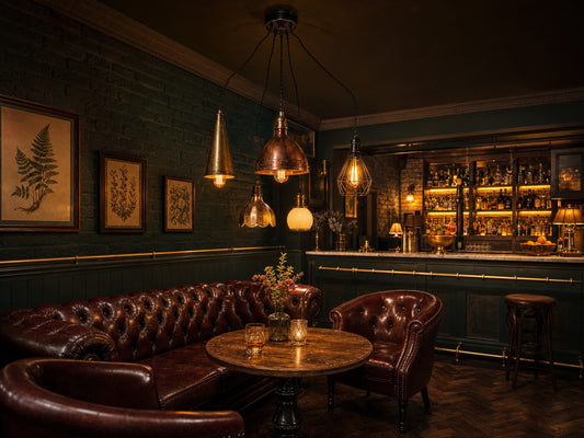 Borough cluster pendant chandelier in a heritage gastro-pub snug with Chesterfield seating