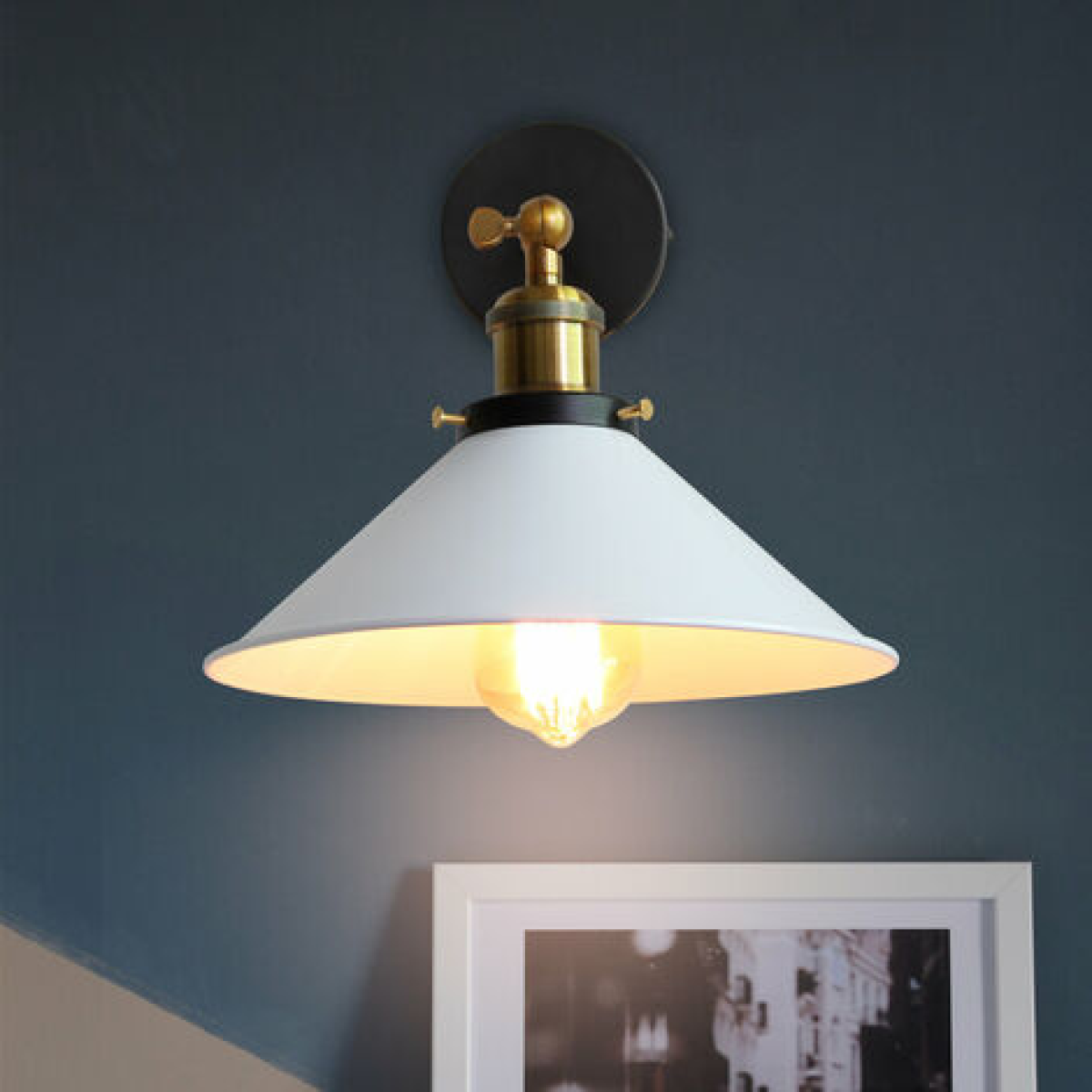 Close-up of the Bayswater Brass-Collar Cone Wall Sconce showcasing its brass detail and matte black finish, highlighting craf