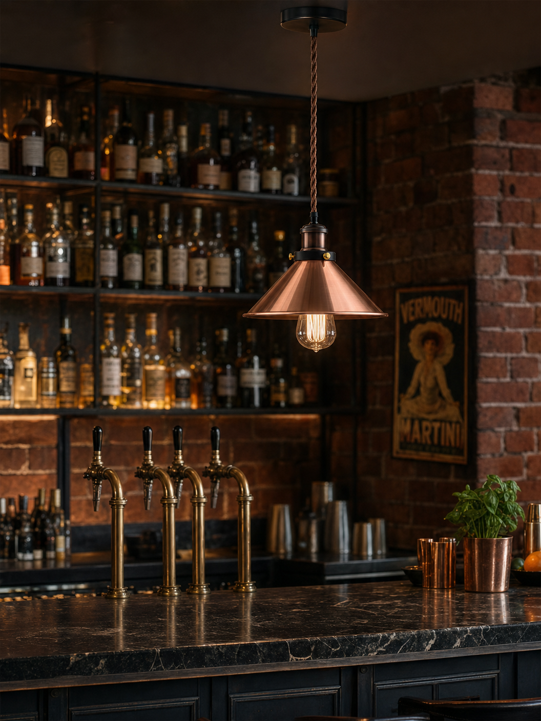 Wapping copper cone pendant light above a dark marble counter in a refined industrial cocktail bar